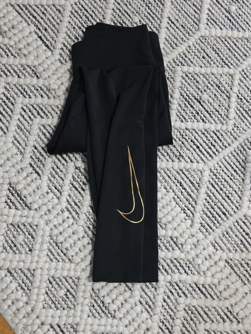 Nike Black Leggings with Gold Swoosh Accent